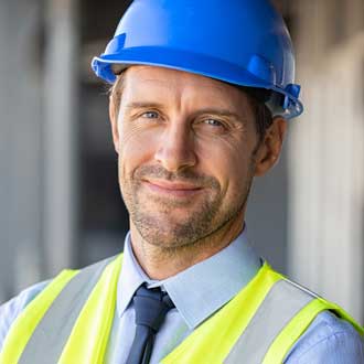 smiling construction foreman on jobsite